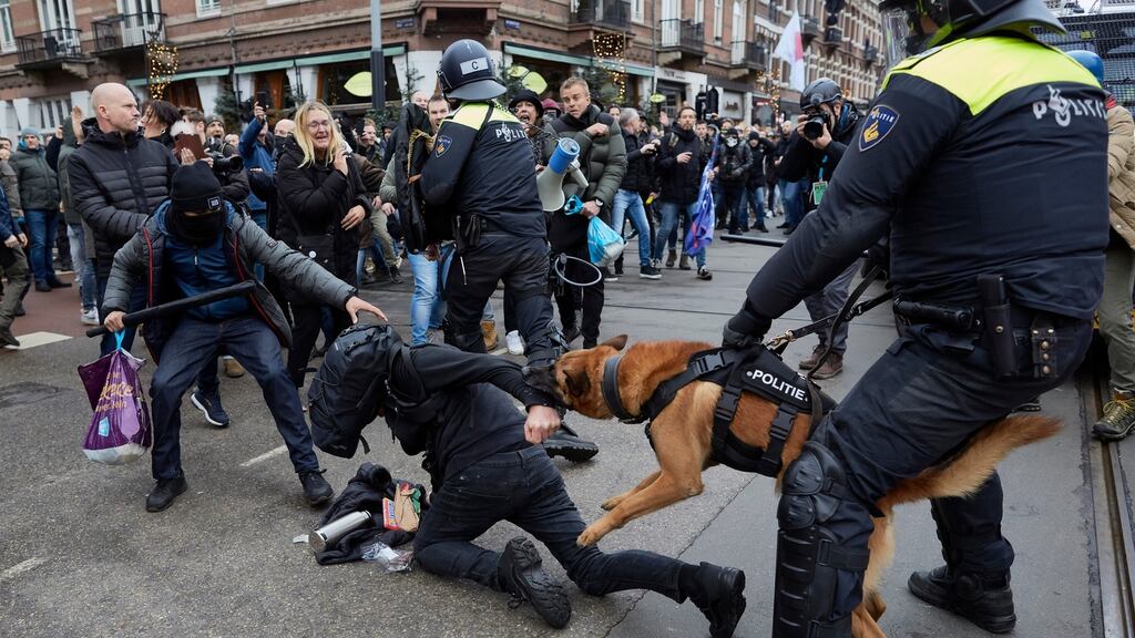 Clashes erupt between police officers and antivaxxers affiliated to far-right parties, near Museumplein, in Amsterdam, earlier this month. Photograph: Pierre Crom/Getty Images