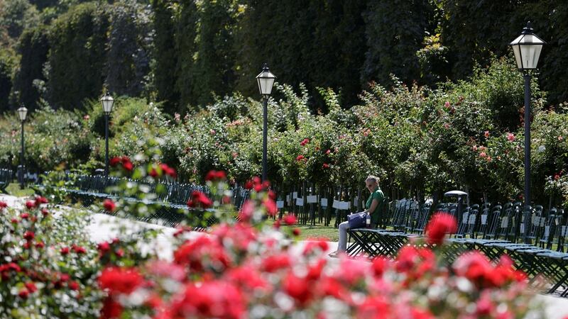 A woman enjoying a public garden in Vienna, Austria, ranked the world’s most liveable city by the Economist Intelligence Unit. Photograph: Heinz-Peter Bader/Reuters