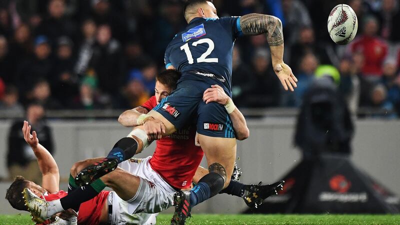 Blues’ Sonny Bill Williams offloads to Ihaia West to score the winning try against the British & Irish Lions at Eden Park in Auckland. Photograph: Andrew Cornaga/Inpho/Photosport