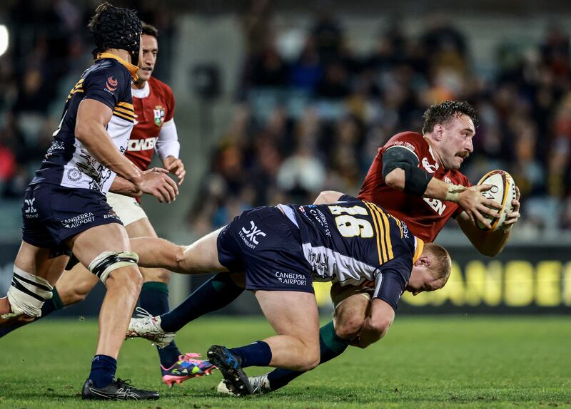 The Lions’ Jack Conan is tackled by Liam Bowron of the Brumbies. Photograph: Dan Sheridan/Inpho