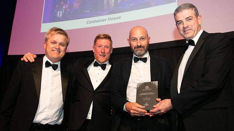 Brett O'Sullivan, Business Development Manager, Kingspan Insulation presents the Sustainability Award for a Single Building or Development award toJP McGann, Buildstruct, Robert Barry, Consulting Engineers & Dougal Sheridan, LiD Architecture.