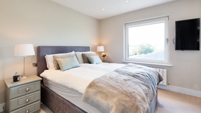Upstairs are three bedrooms, one en suite and a small family bathroom