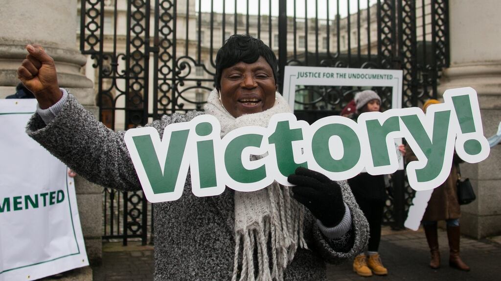 Sharon Buzuzi, from Zimbabwe, who lives on the Navan Road, Dublin, outside Government Buildings last week following an announcement by Minister for Justice Helen McEntee of a new scheme to regularise long-term undocumented migrants. Photograph: Gareth Chaney/Collins
