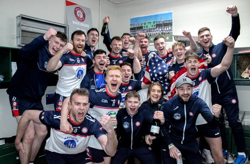 New York players celebrate in the dressing room after the victory against Leitrim. Photograph: Sharon Redican/Inpho