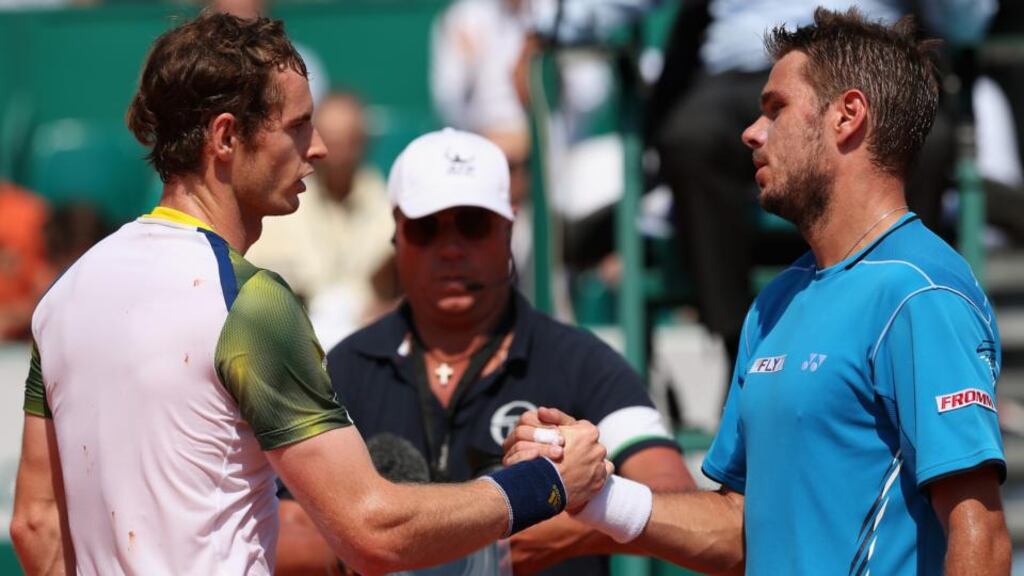 Andy Murray shakes hands after his straight sets defeat against Stanislas Wawrinka in their third round match of the ATP Monte Carlo Masters in Monaco. Photograph: Clive Brunskill/Getty Images