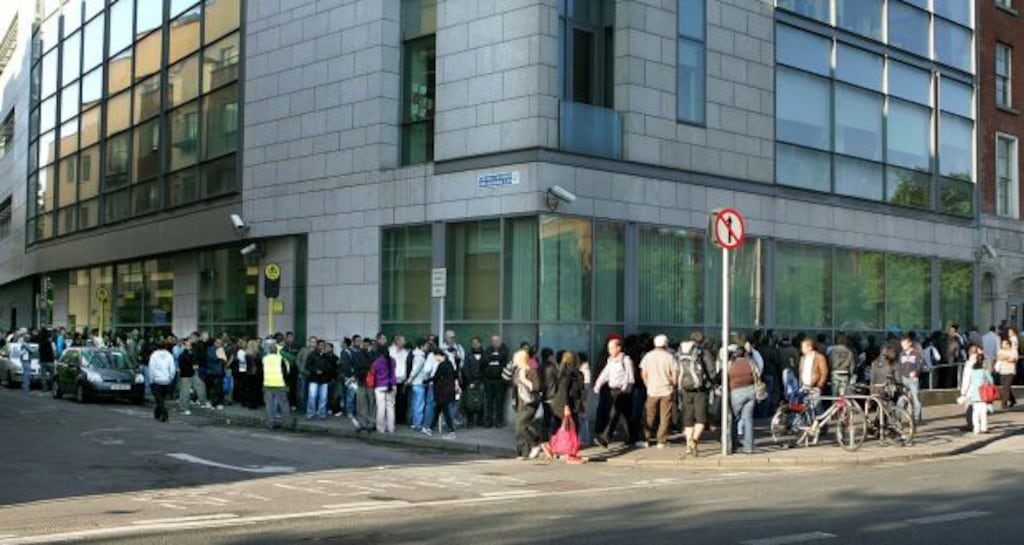 A large queue of people outside the Garda National Immigration Bureau office on Burgh Quay in September. Photograph: David Sleator