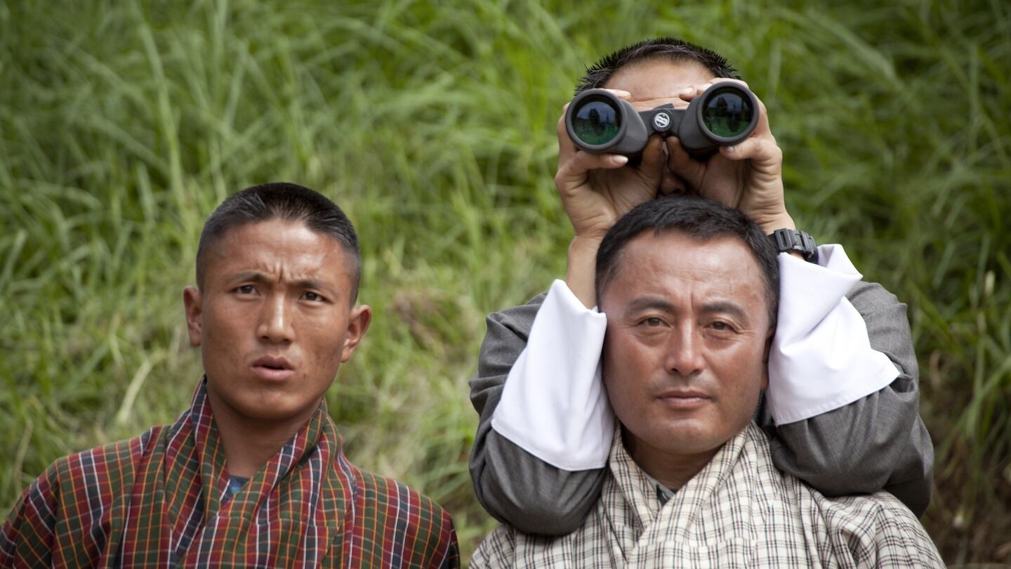 Bhutan’s national sport: spectators watch an archery tournament. Photograph: Kuni Takahashi/New York Times