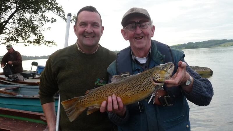 A delighted Kevin Keogh, Multyfarnham (right), with his winning trout of 6lb 7oz at the Lough Lene chairman’s competition, with boating partner Frank Brennan