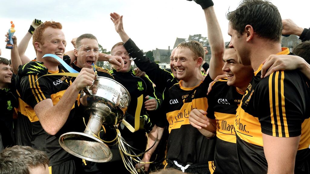 Dr Crokes captain Johnny Buckley and Man of the Match Colm Gooch Cooper celebrate winning the Kerry County Championship at Fitzgerald Stadium, Killarney. Photo Don MacMonagle