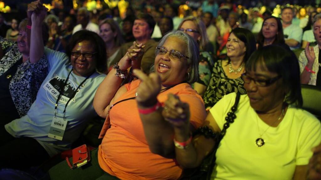 People enjoy the music during a Hurricane Katrina 10th anniversary event at the Smoothie King Center on Saturday, in New Orleans, Louisiana. Photograph: Getty