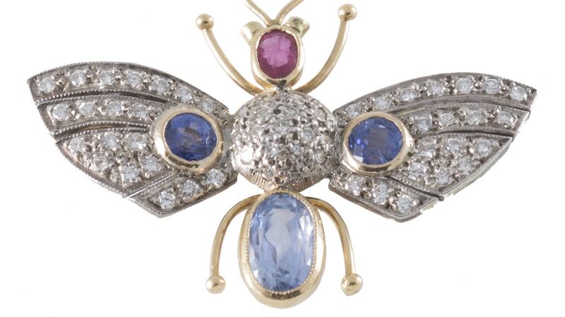 A ruby, sapphire and diamond ‘Butterfly’ brooch, with ruby of approx. 0.30ct, sapphires of approx. 3ct, diamonds of approx. 0.90ct, for auction in O’Reilly’s Auctionrooms, Francis St, Dublin