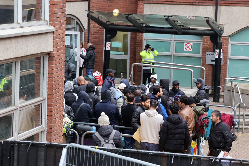 Fencing in place around International Protection Office (IPO) and surrounds on Mount Street, Dublin to stop tents being pitched. As queues form to enter building. Photograph: Dara Mac Dónaill