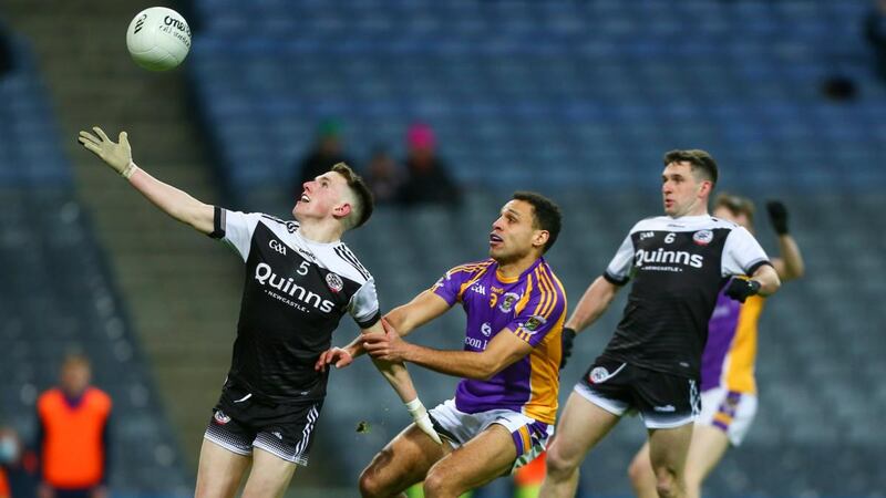 Kilcoo’s Micéal Rooney prevents a goal scored under pressure from Kilmacud Crokes’ Craig Dias during the the All-Ireland Senior Club Football Final at Croke Park. Photograph: Ken Sutton/Inpho
