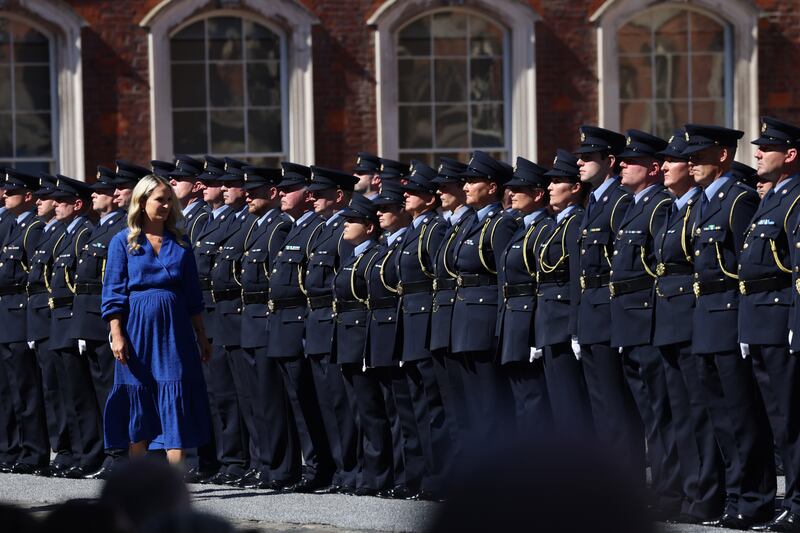 Minister for Justice Helen McEntee inspects the guard of honour at an An Garda Síochána National Centenary Commemorative Event at Dublin Castle in Dublin marking the handover of policing duties. Photograph: Dara Mac Dónaill/The Irish Times