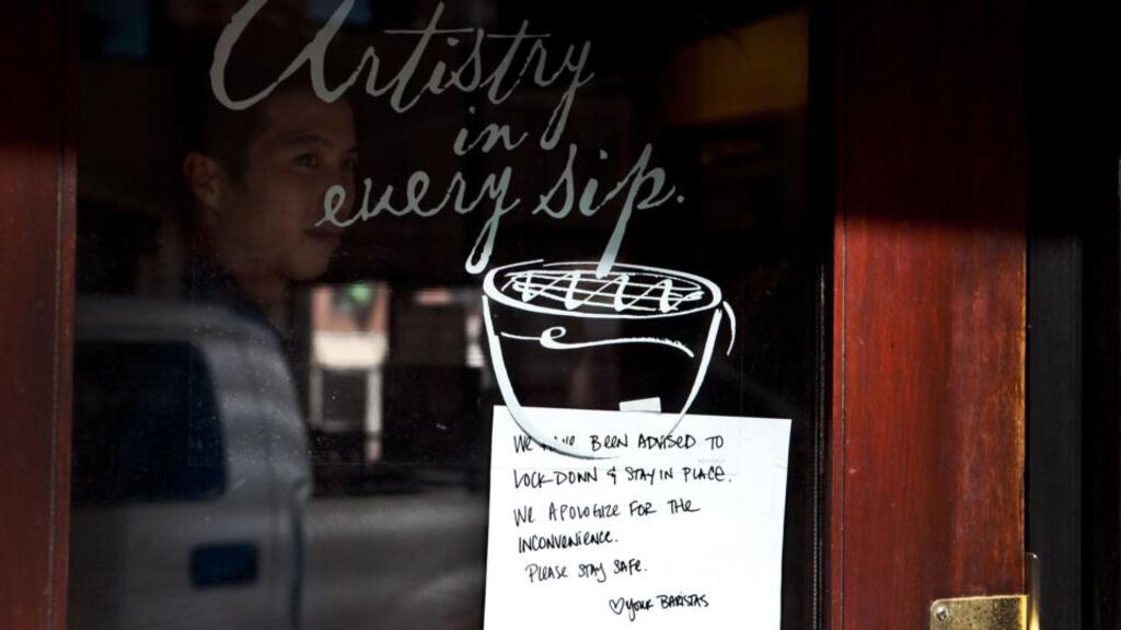 Starbucks windown in the financial district in Boston, Massachusetts. Photograph: Kayana Szymczak/Getty Images