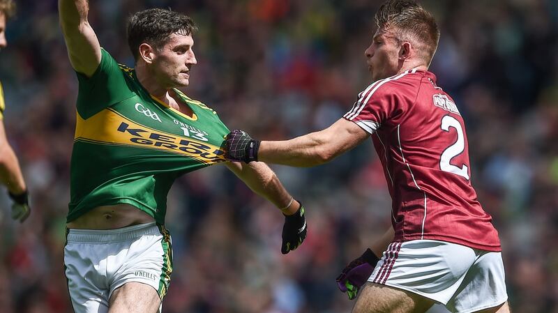 Galway’s Eoghan Kerin tussles with Paul Geaney of Kerry. Photograph: Tommy Grealy/Inpho