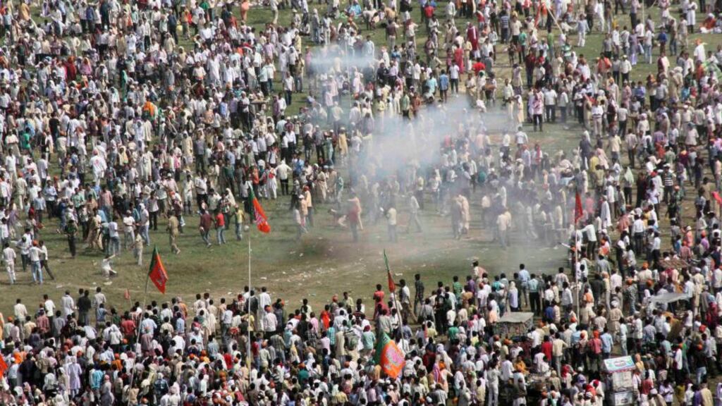 Smoke rises after a bomb exploded near a public ground where Gujarat’s chief minister and Hindu nationalist Narendra Modi, the prime ministerial candidate for India’s main opposition Bharatiya Janata Party (BJP), was to address a rally in the eastern Indian city of Patnatoday. Photograph: Krishna Murari Kishan/Reuters