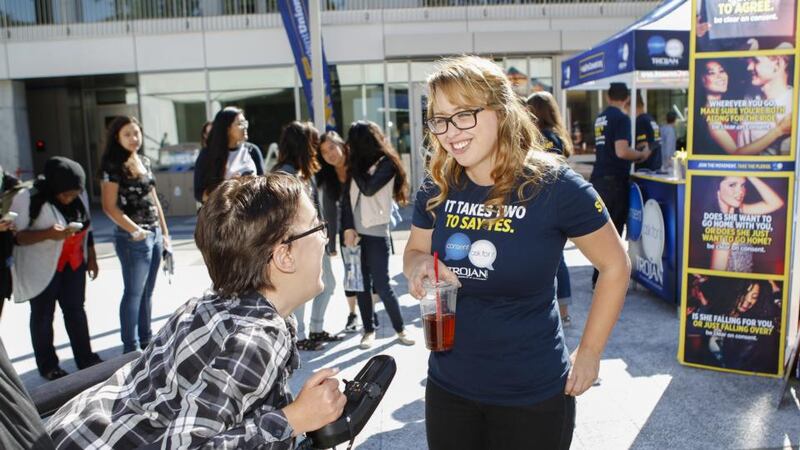 University campuses, too, are seeking positive messaging. Youtuber Laci Green (R) calls on students to ask for consent. Photograph:  Kimberly White/Getty Images for Trojan