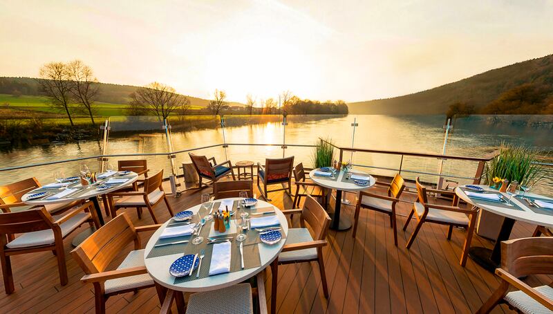 Viking River Cruises: outdoor dining on the deck of a Viking longship. Photograph: M Wollsdorf/360 Moving Pictur