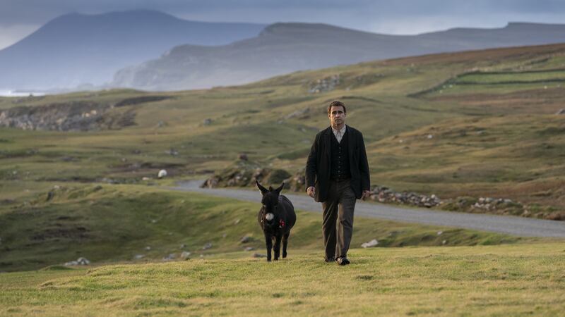 Actor Colin Farrell as Padraic Suilleabhain with Jenny the donkey in the film The Banshees Of Inisherin. Photograph: 20th Century Studios/Jonathan Hession