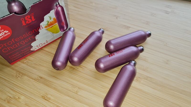 Canisters of nitrous-oxide. Nitrous is typically consumed by emptying the canisters into balloons, from which the gas can then be easily inhaled