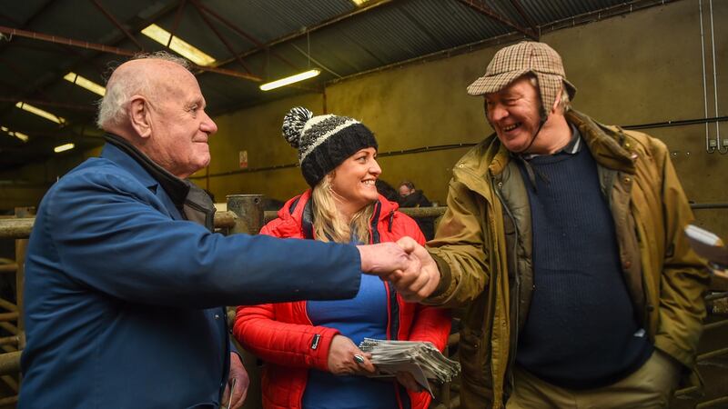 Cllr Sarah O’Reilly of Aontú canvassing at Clones mart, Co Monaghan, with Jim Duffy from Monaghan and Donal Keappock from Cootehill, Co Cavan. Photograph: Philip Fitzpatrick
