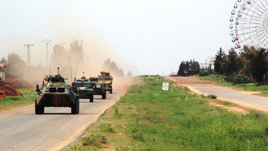 Turkish and Russian armoured vehicles on joint patrol of the M4 Motorway on the western outskirts of the city of Saraqib in the Idlib de-escalation zone. Photograph: Russian Defence Ministry\TASS via Getty