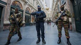 Belgian police arrest 16 people in Brussels raids