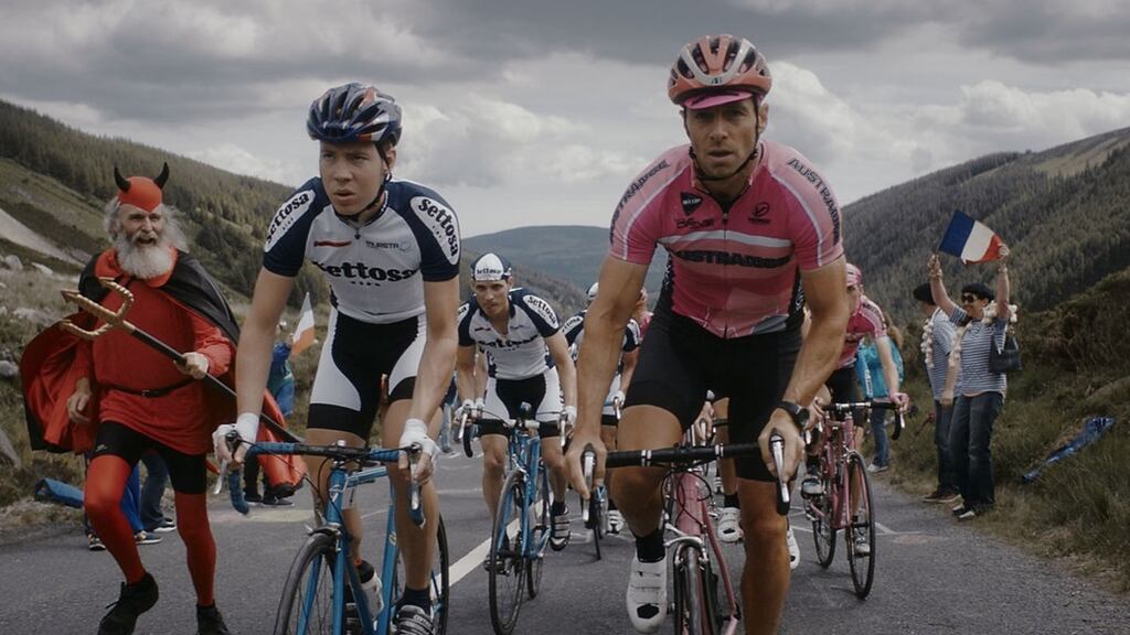 Louis Talpe (in pink) stars as Dominique Chabol.