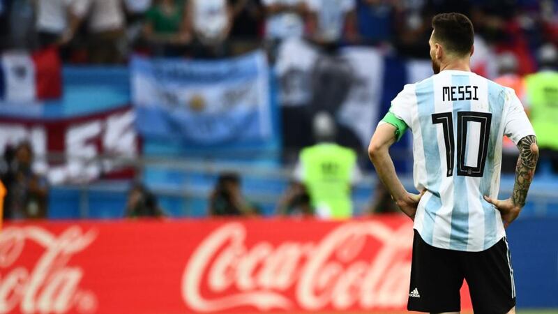 Lionel Messi stands on the pitch at the end of the World Cup round of 16 game against France at the Kazan Stadium. Photograph: Jewel Samad/AFP/Getty Images