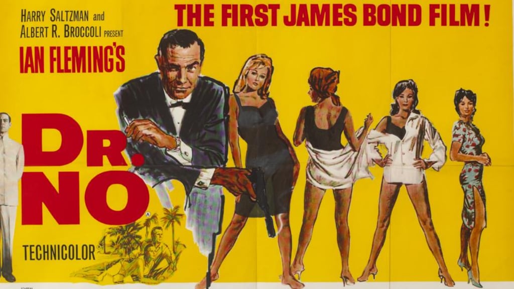 The Irish version of the 1962 cinema poster for the first James Bond film, Dr No, which was censored by having a black dress “painted” on to Ursula Andress to hide her bikini.