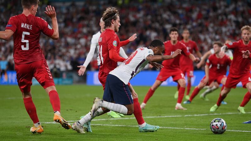 England’s Raheem Sterling earns England a penalty in the Euro 2020 semi-final against Denmark at Wembley. Photograph: Laurence Griffiths/Getty Images