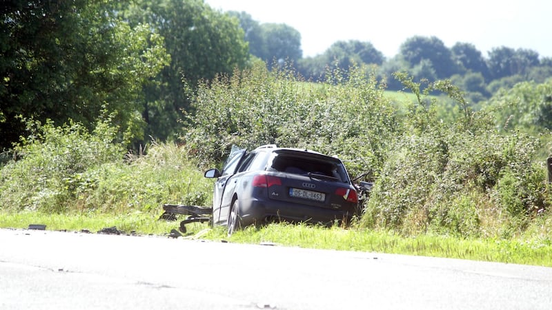 The black Audi car which was being driven by Marco Velocci is seen at the side of the road following a head-on collision with a truck on Tuesday morning. Photograph: Press 22