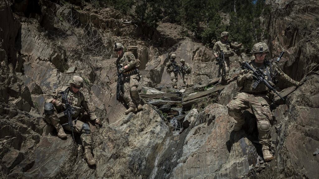 American soldiers from the 101st Airborne Division walkin in the mountains of Paktia Province in Afghanistan, in April 2013. Photograph: Sergey Ponomarev/The New York Times