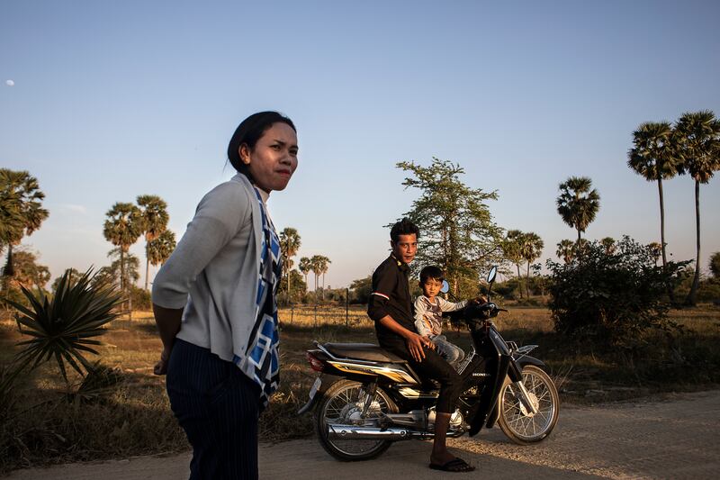 Ry Ly, her husband and the three-year-old boy she was forced by the courts to raise after birthing him as a surrogate for another man. Photograph: Nadia Shira Cohen/The New York Times