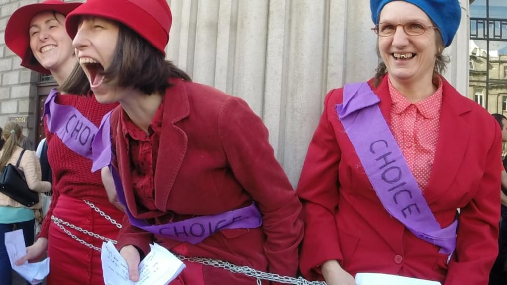 Members of the Speaking of Imelda performance group chained themselves to the columns of the General Post Office in Dublin for two hours on Monday as they made an unofficial contribution to celebrations of the Easter Rising of 1916.