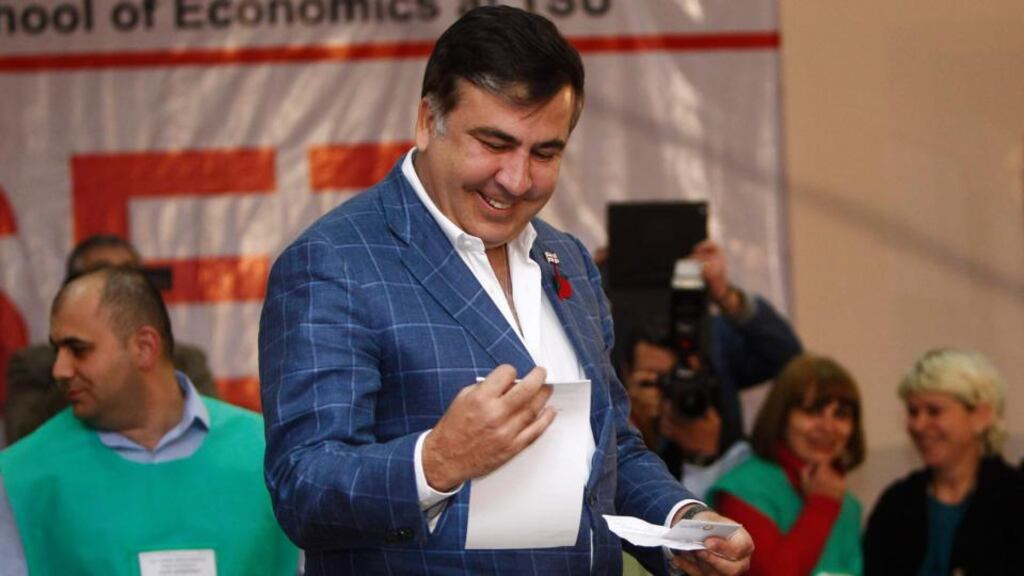 Georgian president Mikheil Saakashvili visits a polling station in Tbilisi yesterday during the presidential election. Photograph: Reuters/David Mdzinarishvili