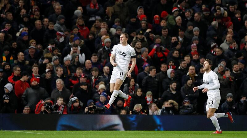 Burnley’s Chris Wood celebrates scoring their second goal. Photograph: Phil Noble/Reuters