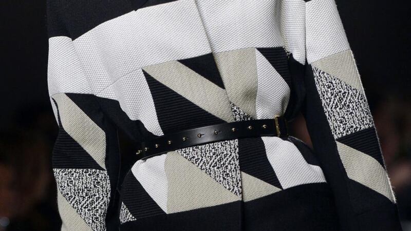 A tailored, zany striped coat in black, cream and white created by Roland Mouret during the 2015-2016 fall/winter ready-to-wear collection fashion show in Paris. Photograph: Miguel Medina/AFP/Getty Images