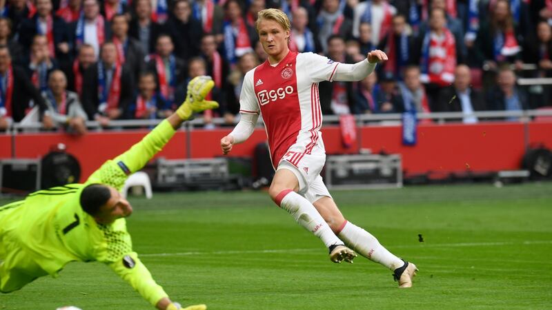 Dolberg scores Ajax’s second goal in the first leg win over Lyon. Photo: Toussaint Kluiters/Reuters