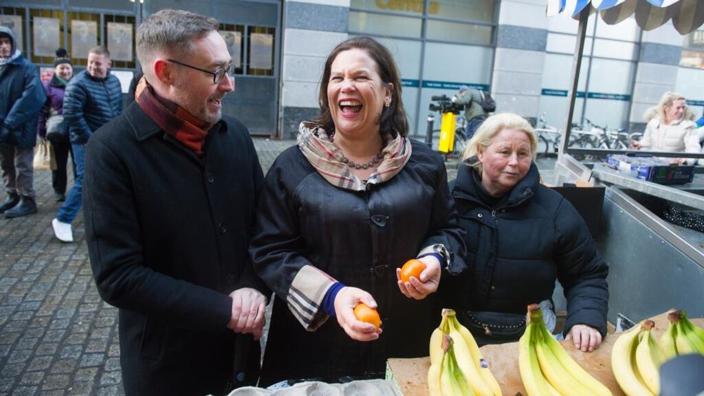 Sinn Féin’s housing spokesman, Eoin Ó Broin, and the party’s leader, Mary Lou McDonald, with a street trader in Moore Street in Dublin, on Monday. Photograph: Aidan Crawley/EPA
