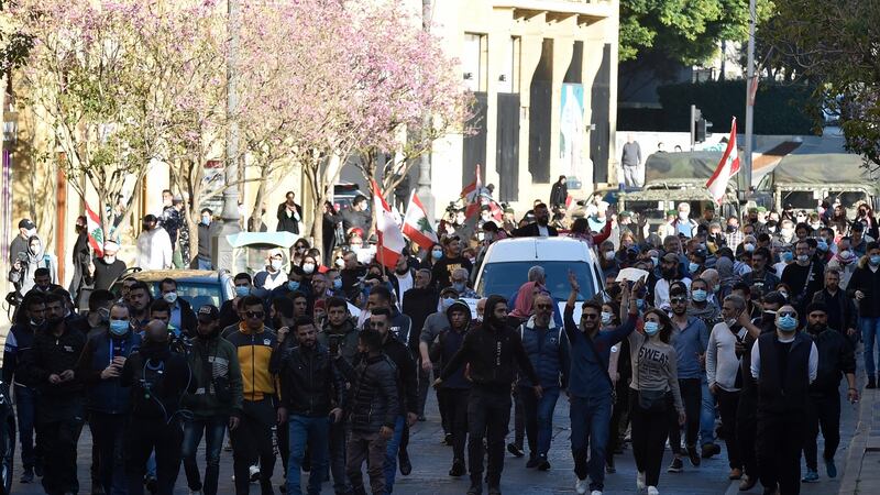 Anti-government protesters march outside the Lebanese parliament in  Beirut on Saturday. Photograph: Wael Hamzeh/EPA