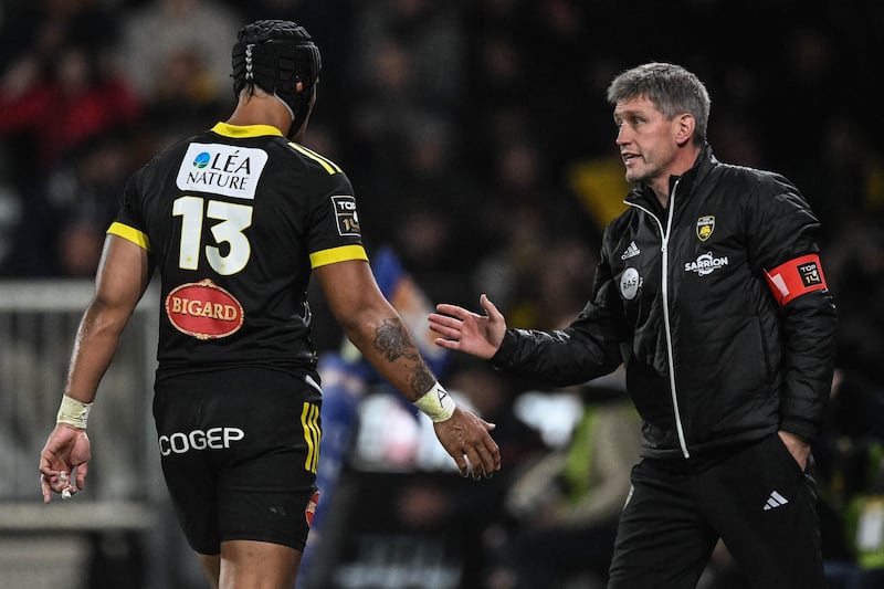 La Rochelle's head coach Ronan O'Gara speaks with La Rochelle's Australian centre Ulupano Seuteni. Photograph: Xavier Leoty/AFP via Getty