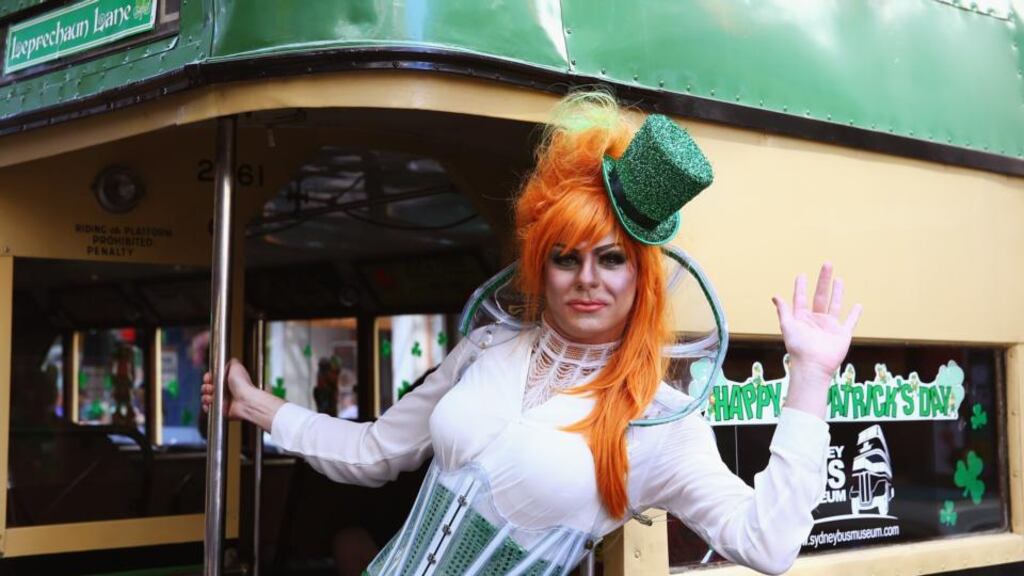 Drag queen Peachy Queen poses from the back of a bus and prepares to march in the St Patrick’s Day parade on behalf of all gay, lesbian, bisexual and transgender people for the first time in Sydney, Australia. Photograph: Don Arnold/Getty Images