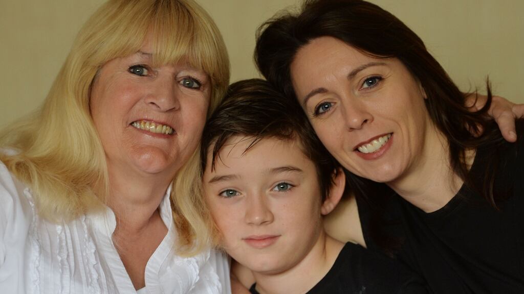 Anne Power with her daughter Arianna and grandson Ben at her home in Ashbourne. ‘Being away from the grandkids is the hardest. It is the little things that you miss; not being able to give them a hug, to listen to their little stories, to give them a cuddle when they are ill.’ Photograph: Alan Betson / The Irish Times
