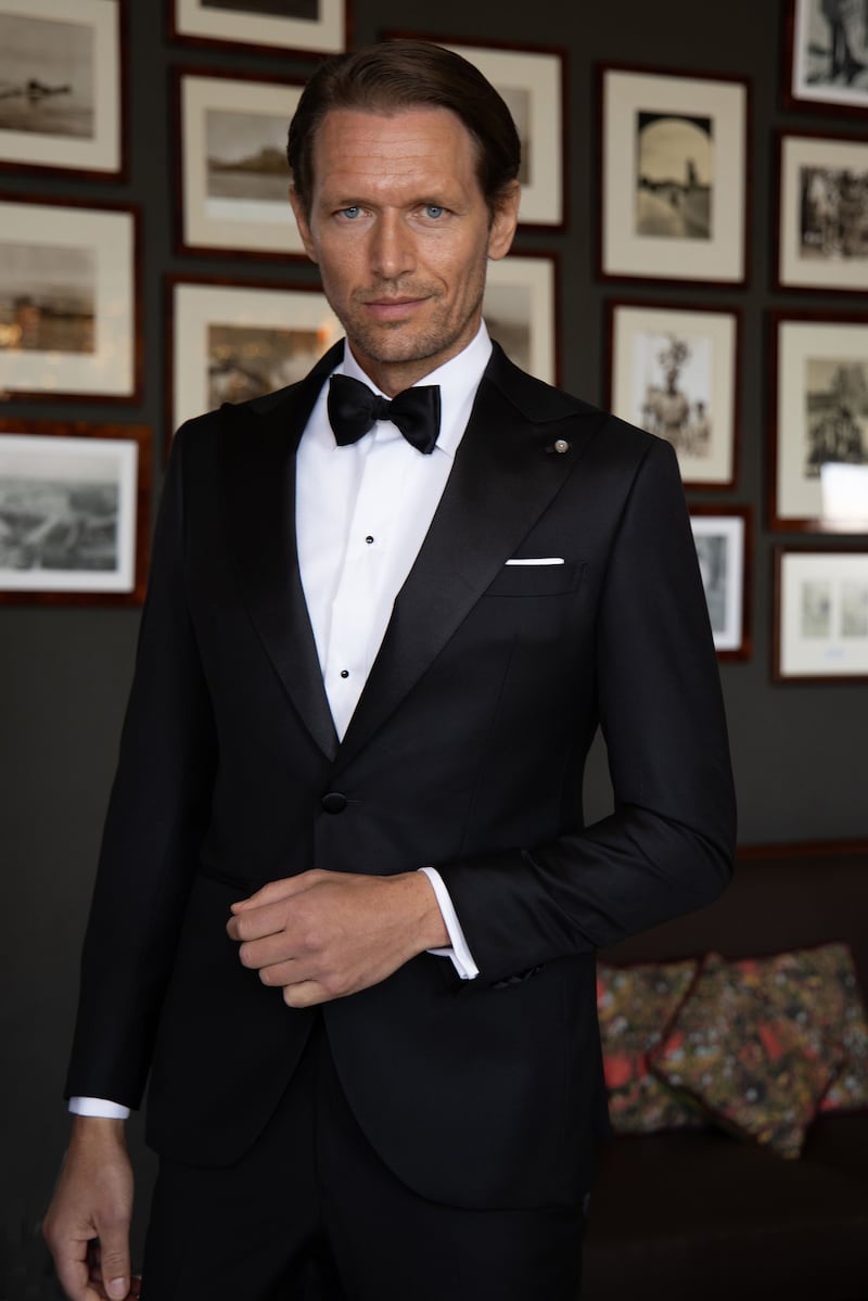 Black-tie attire: black dress suit (€1,145) and a tuxedo slim-fit white shirt (€230), from Louis Copeland