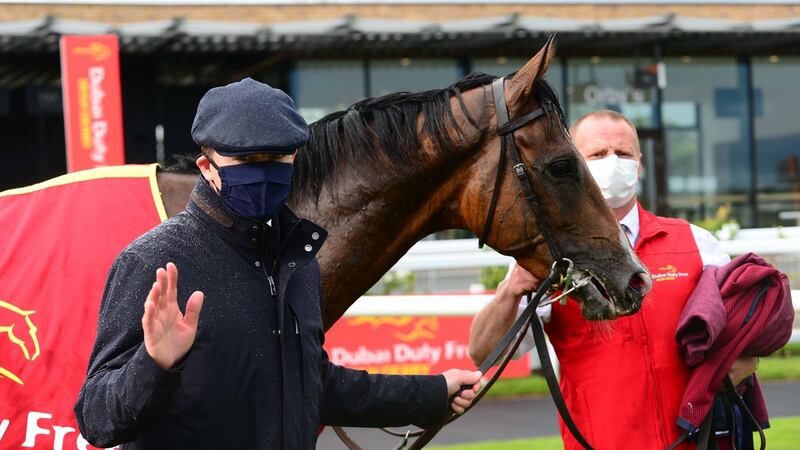 Aidan O’Brien with Irish Derby winner Santiago. Photograph: PA