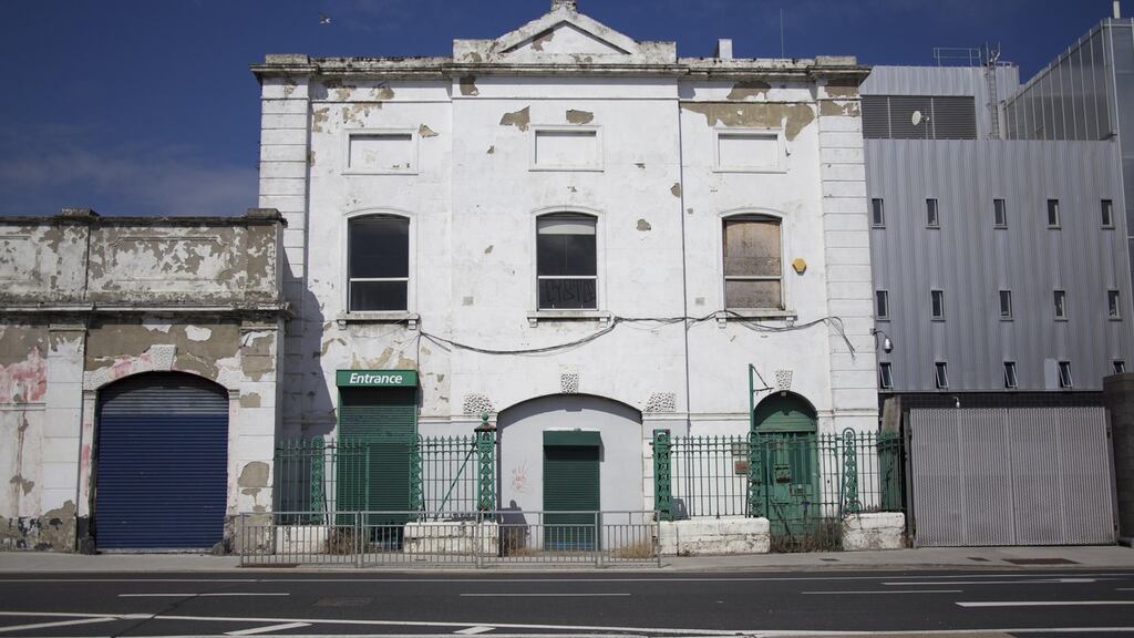 An old vacant building near the docklands in Dublin. Owners of vacant houses and apartments may be granted money to refurbish them and to make them available for social housing, under Government plans. File photograph: Sara Freund/The Irish Times