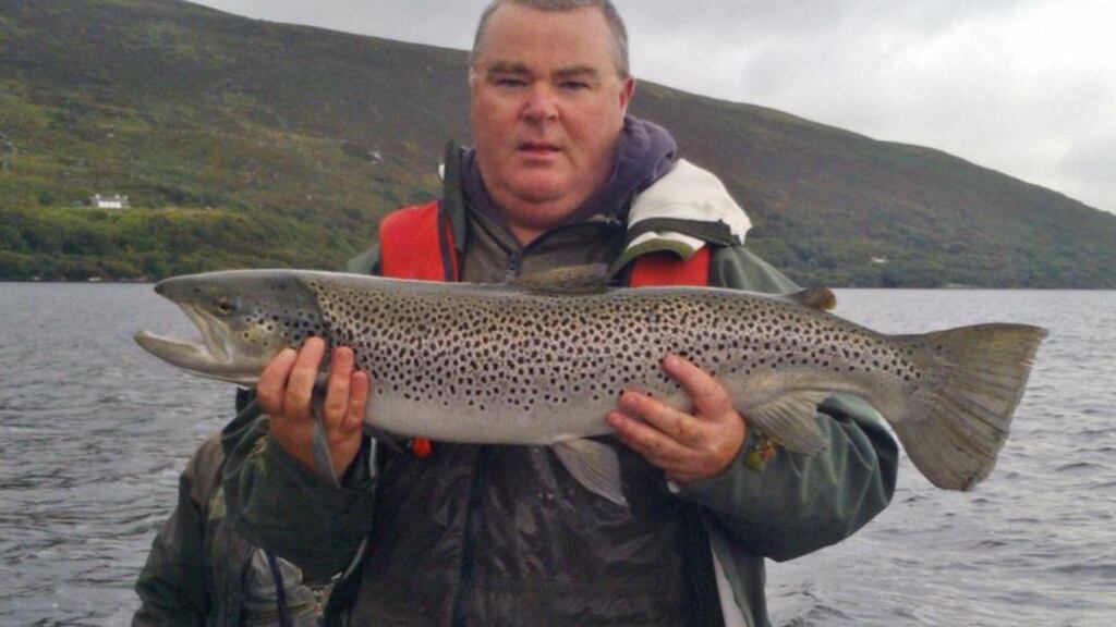 Galway hooker: Toby Bradshaw from Galway with a  trout of 5.5kg (12lb) caught on Lough Sheelin on a Green Peter
.