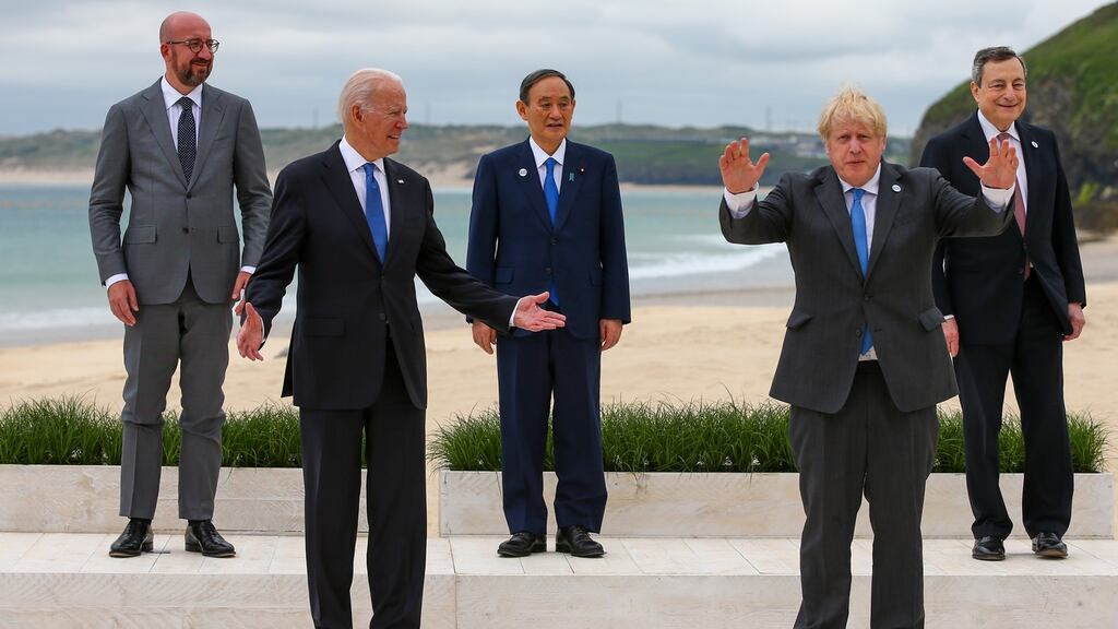 European Council president Charles Michel, US president Joe Biden, Japan’s prime minister Yoshihide Suga, British prime minister Boris Johnson and Italy’s prime minister Mario Draghi on the first day of the G7 summit in Carbis Bay, Cornwall on Friday. Photograph: Hollie Adams/Pool/EPA